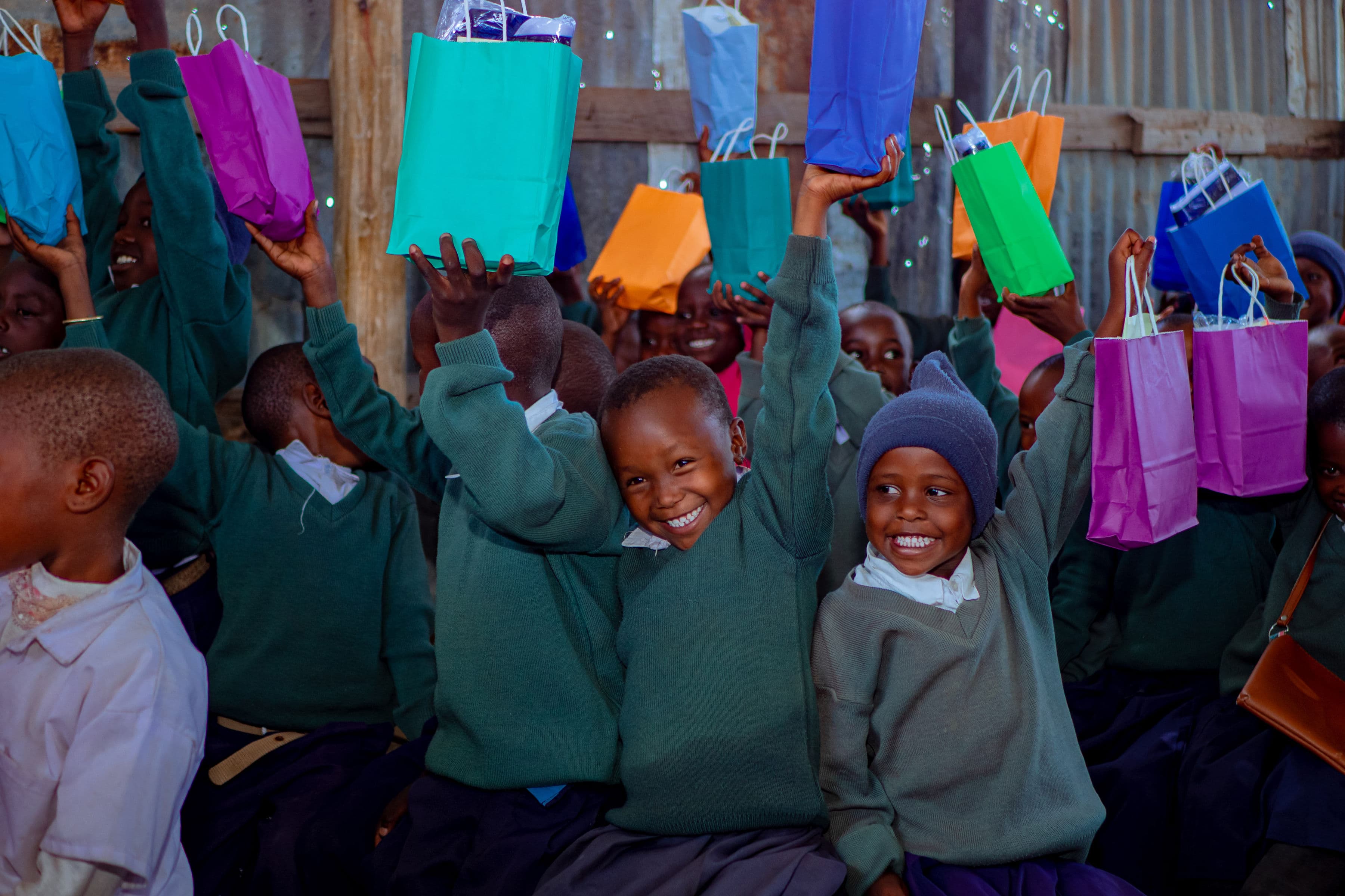 Lion of Judah pupils celebrating together with school gifts